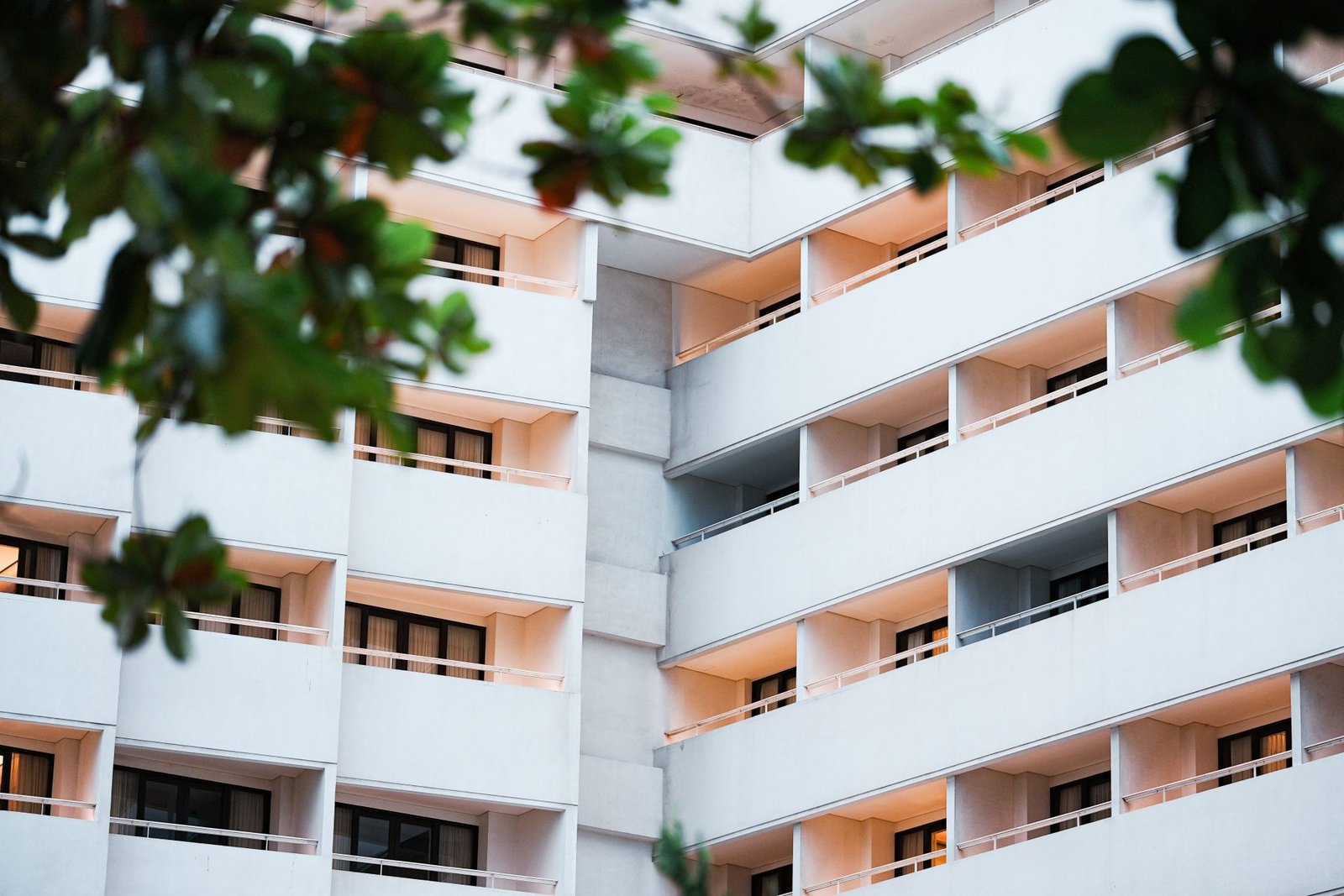 Hotel with rows of guest room balconies, hotel insurance